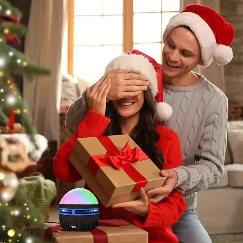 Multicolor LED galaxy projector light near people holding gift boxes, glowing in the scene.