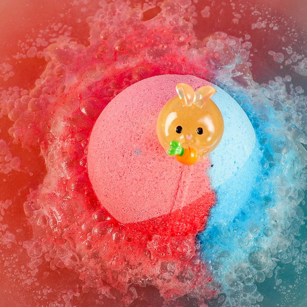 Single kids bath bomb with embedded animal surprise toy in red and blue fizz