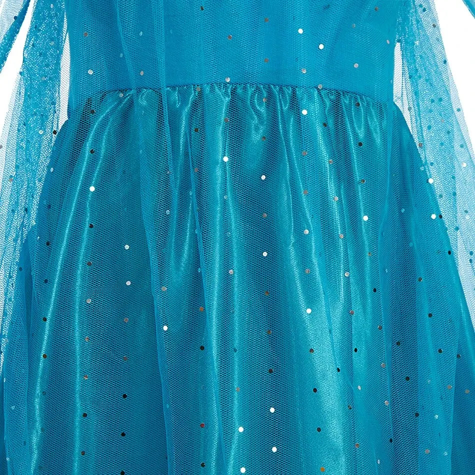 Turquoise tulle overlay skirt with scattered glitter dot details