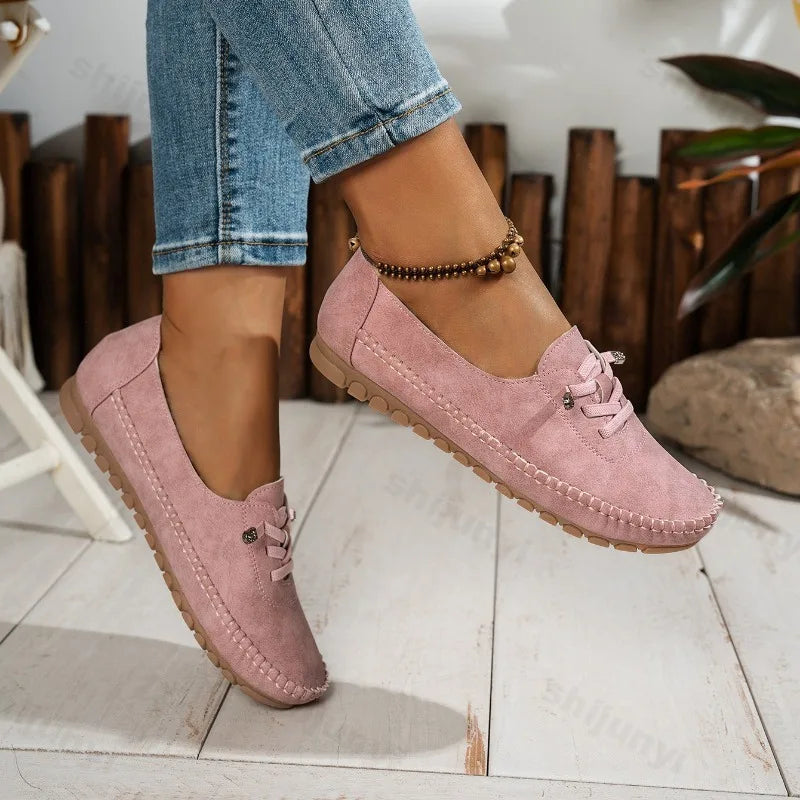 Women's lace-up loafers in dusty pink suede with round toe and stitched moccasin sole