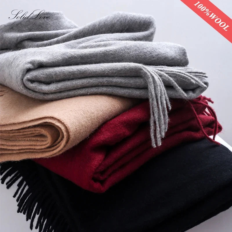100% wool winter scarf set, folded in gray, tan, red, and dark colors with fringe