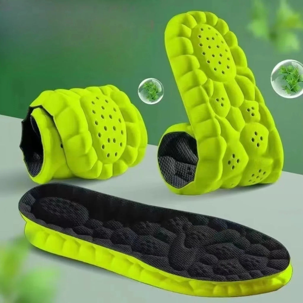 Green sport insoles with perforated arch and black fabric top layer for comfort