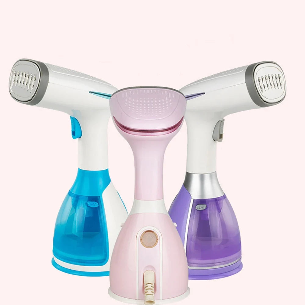 Garment steamer set showing pink, white, and purple units with blue water cup