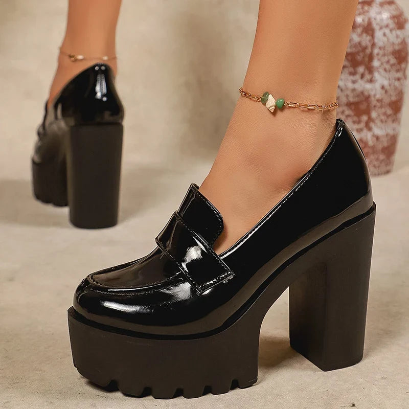 Black patent Mary Jane platform loafers with thick heel and strap