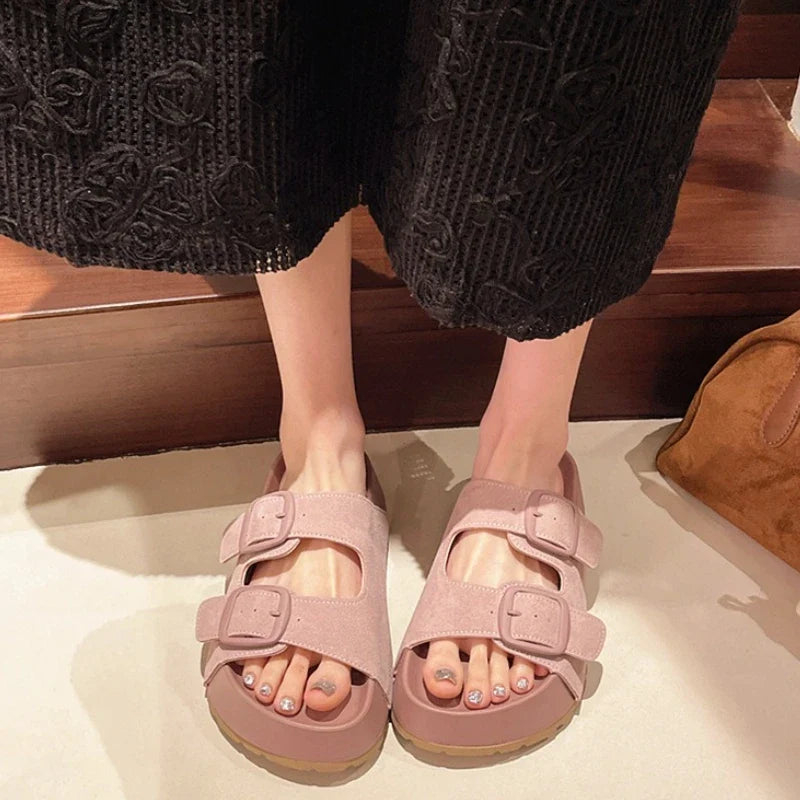 Women’s platform slide sandals with two buckle straps, dusty pink color.