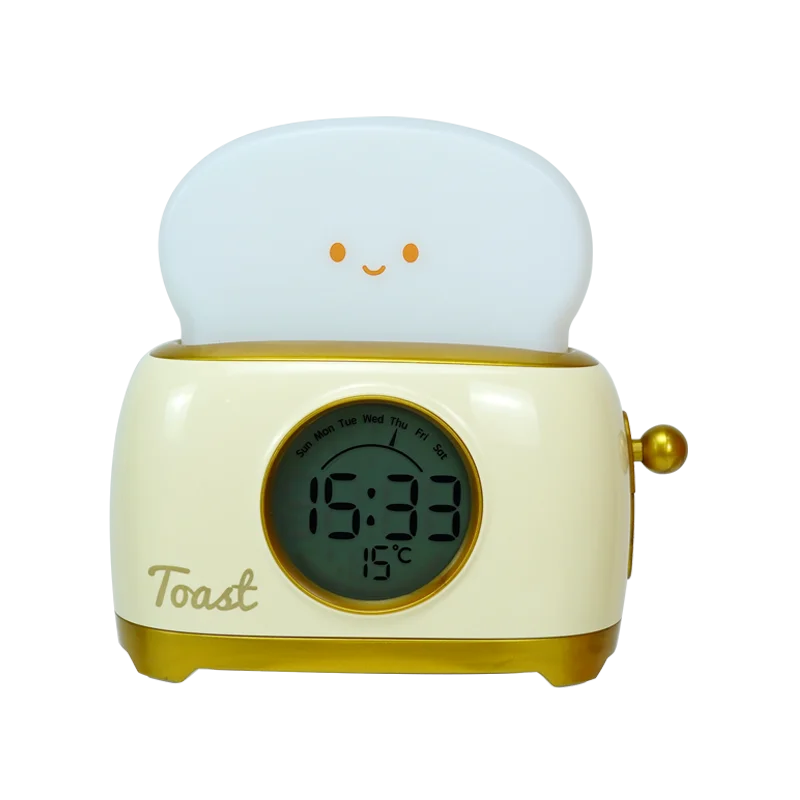 Cream toaster-shaped kids alarm clock night light with glowing face display and handle