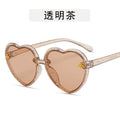 Kids heart-shaped sunglasses with tan frames and clear tint lenses, star details