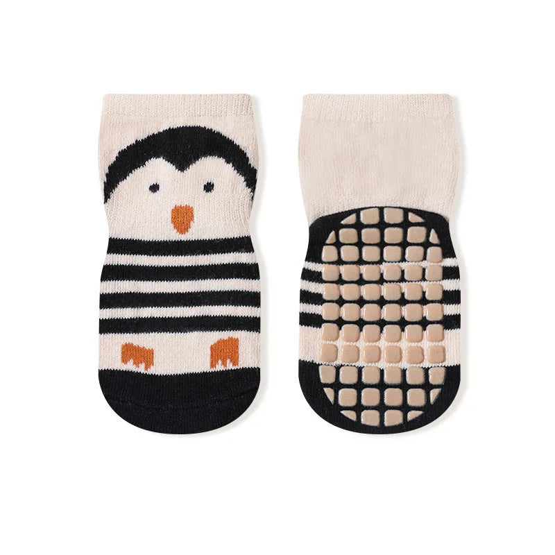 Kids non-slip floor socks with penguin face and striped band, grippy grid soles
