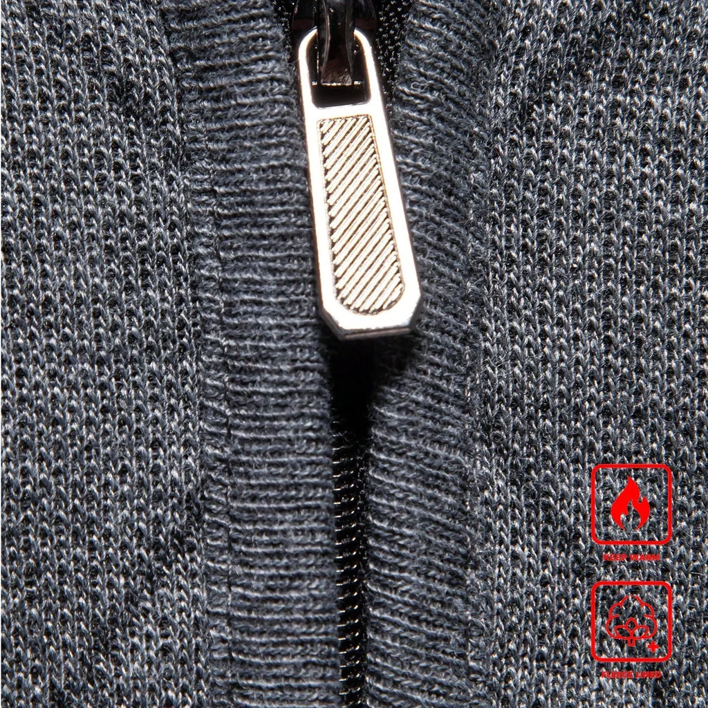 Half-zip front of dark gray knit sweater with silver zipper and textured diamond knit