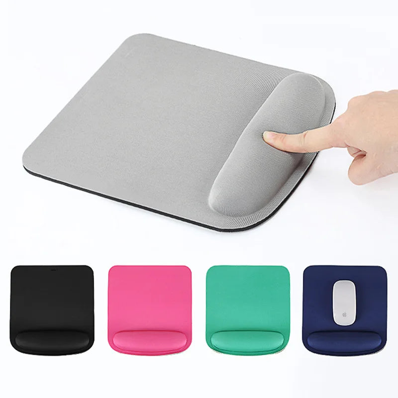 Grey ergonomic mouse pad with padded wrist rest and rounded corners