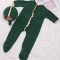 Green dinosaur hooded newborn jumpsuit with footed legs and drawstring