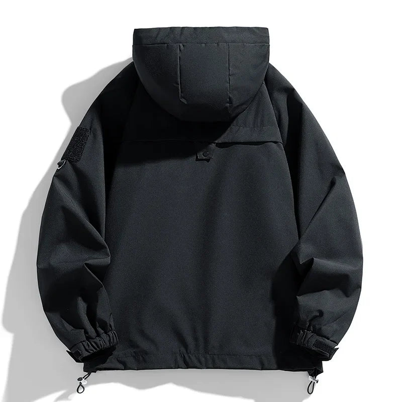 Men's black hooded waterproof windbreaker jacket with back yoke and adjustable cuffs