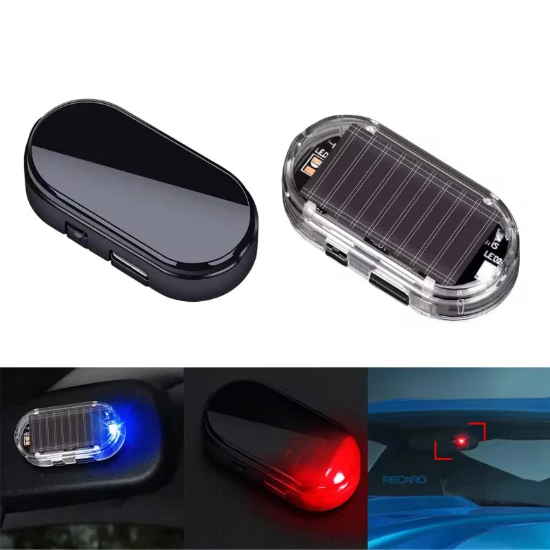 Black-cased solar dummy security alarm light with red LED glow, oval body