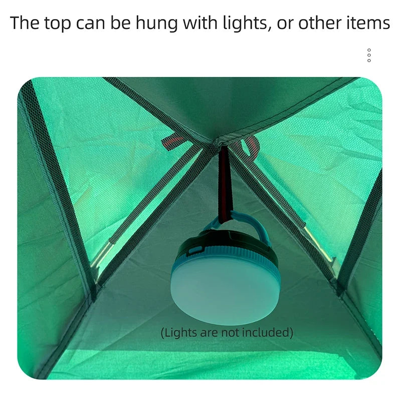 Green tent interior with hanging hook and triangular support poles