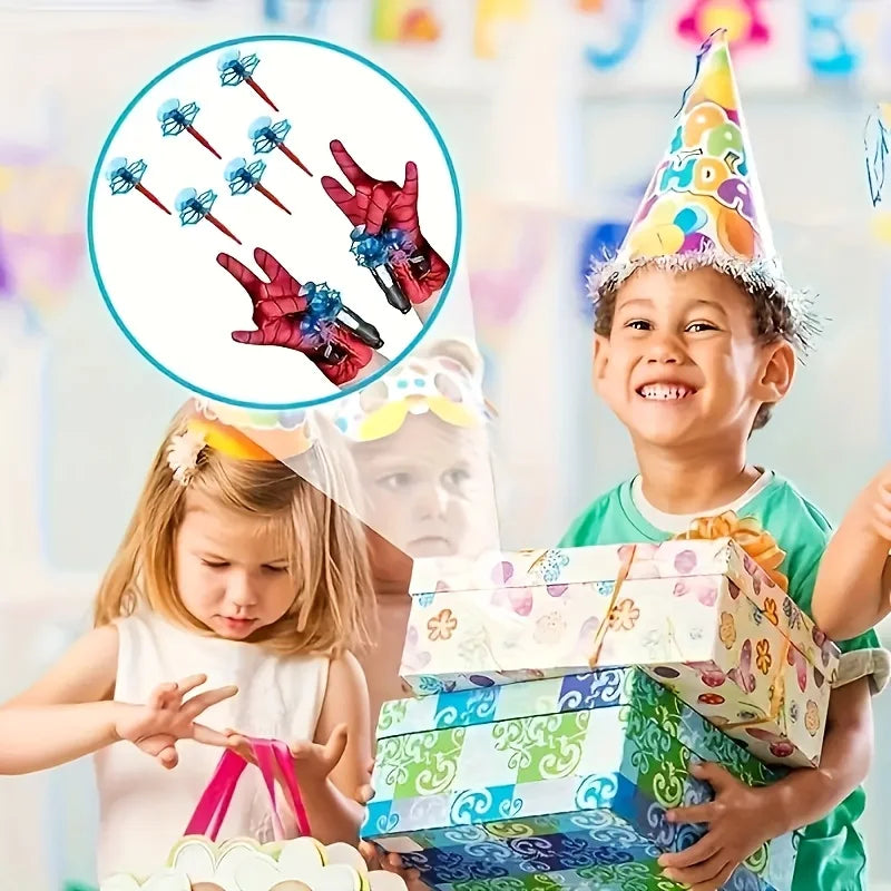 Red spider wrist launcher gloves with blue web shooter attachments, shown on children