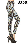 Plus-size printed leggings with light-green leaf pattern on dark fabric