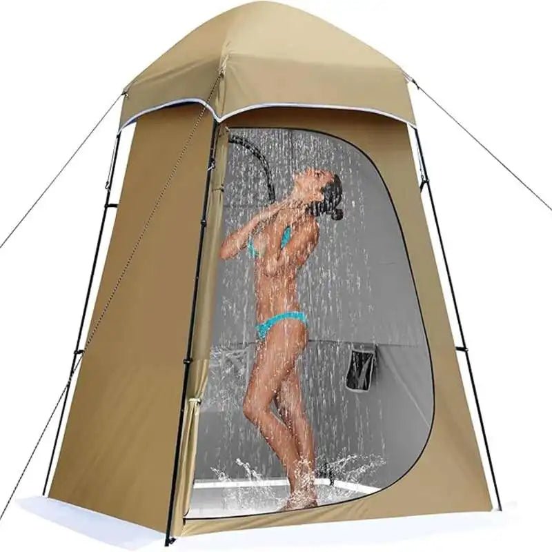 Tan shower tent with arched front mesh window and privacy door, waterproof shelter.