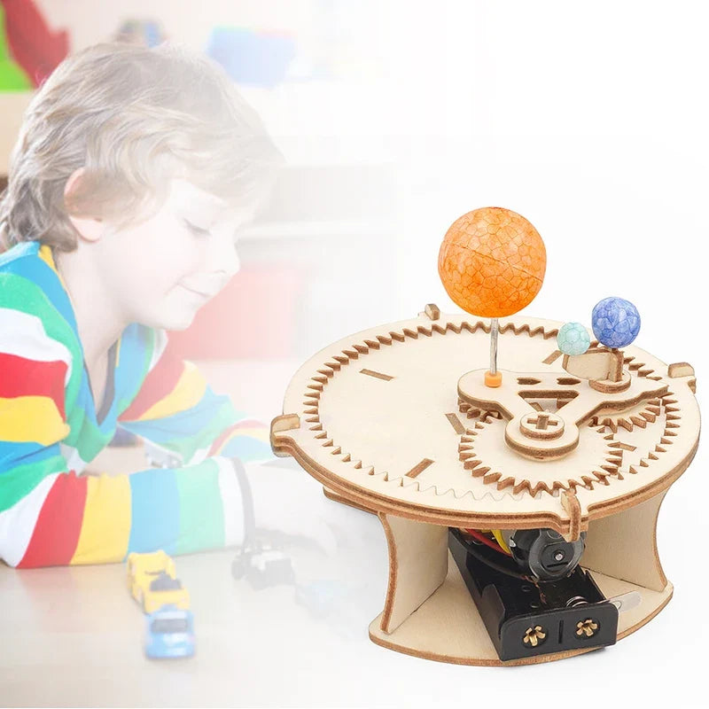 Solar system wooden puzzle kit with orange and blue planet spheres on beige gears