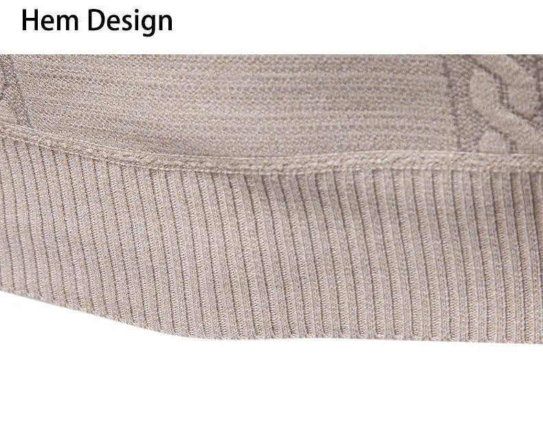 Beige ribbed hem band at bottom of sweater