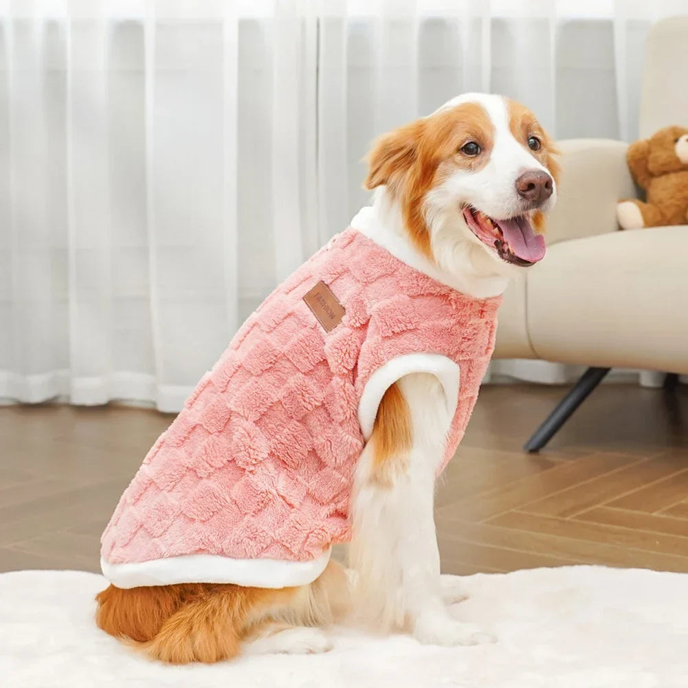 Pink fleece dog pullover sweater with brown patch label and white trim