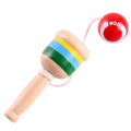 Striped wooden cup-and-ball toy with green-blue-yellow bands and red ball on white cord