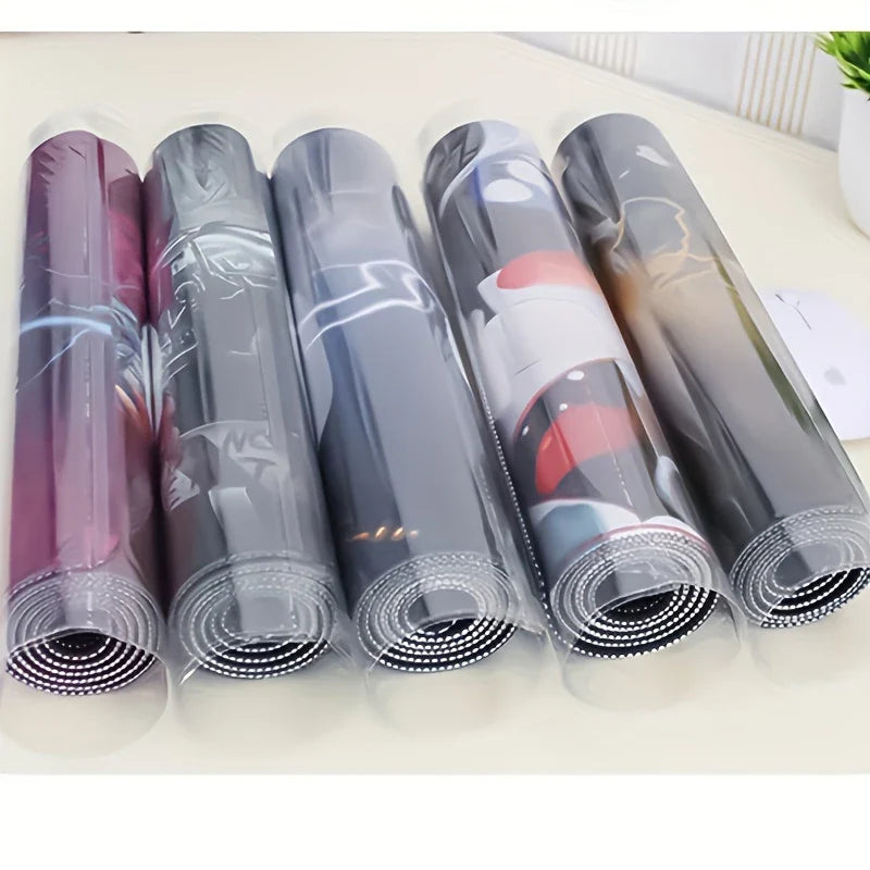 Rolled XXL gaming mouse pads, pastel and dark rolls arranged in a row with stitched hems