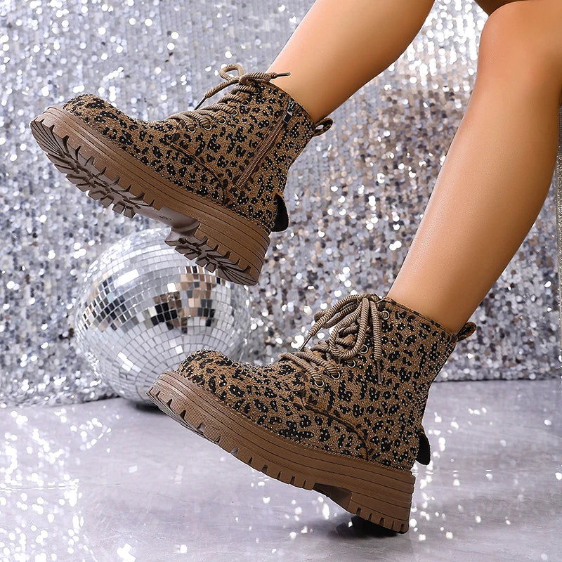 Brown leopard-print lace-up ankle boots with rugged tread sole