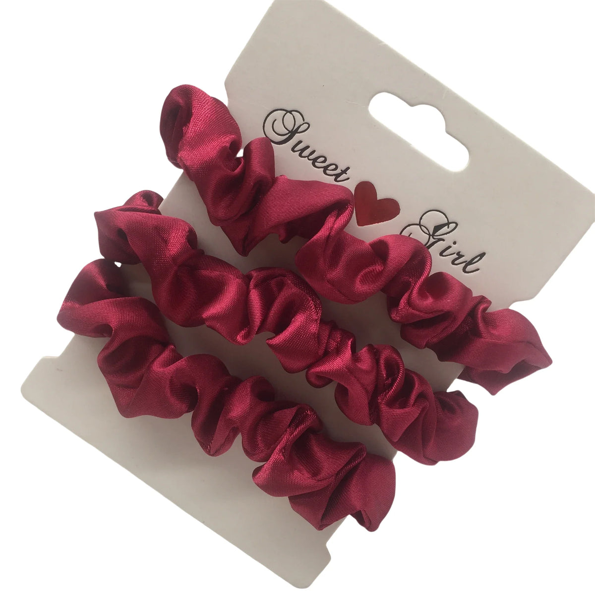 Burgundy silk satin scrunchie hair tie with gathered ruffled texture