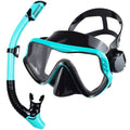 Adults dry snorkeling mask and snorkel set with teal frame accents and black mask skirt.
