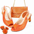 Orange rhinestone peep-toe heels with matching beaded handbag and chain strap