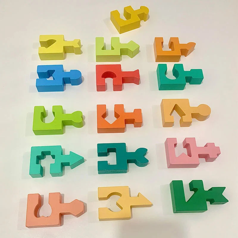 Assorted wooden shape pieces in rainbow colors, interlocking jigsaw forms