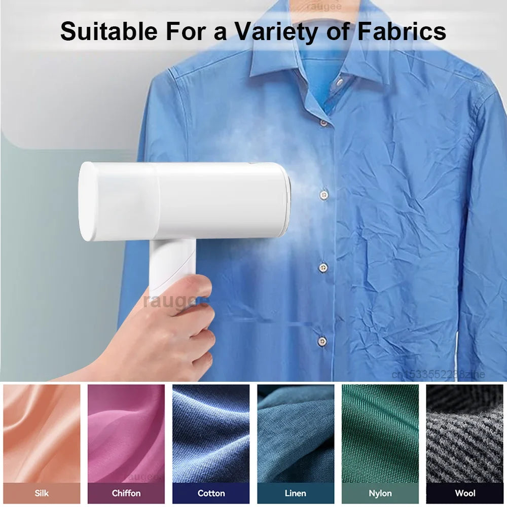 Handheld garment steamer steaming a blue button-up shirt