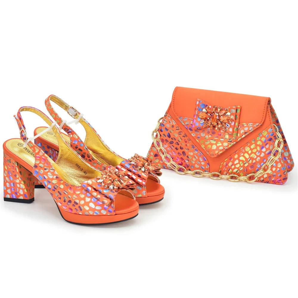 Orange peep-toe heeled shoes and matching patterned clutch bag with jewel bow detail