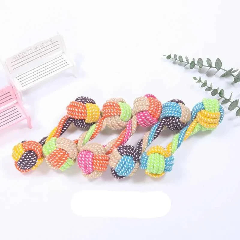 Braided rope dog tug toys with knotted ball ends in green, pink, orange, blue, yellow, beige