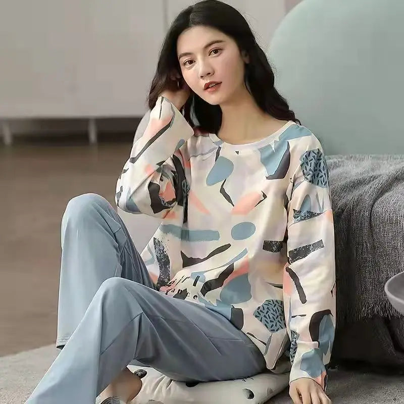 Women’s long-sleeve pajama set with light-blue patterned top and matching pants