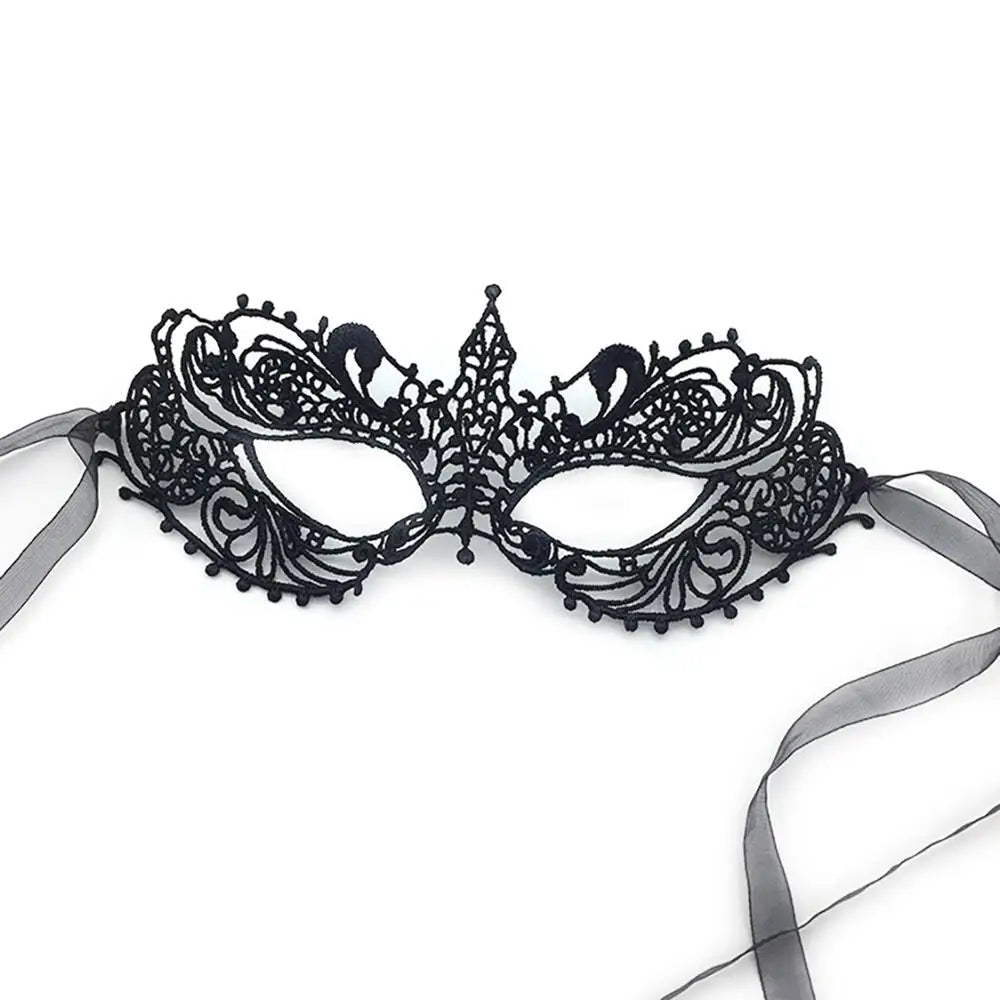 Black filigree cat masquerade mask with ribbon trim and lace cutouts