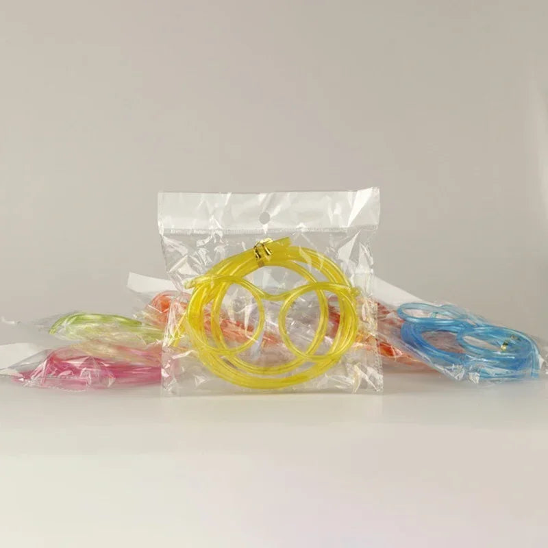 Yellow novelty straw glasses set in clear bag with built-in drinking straw