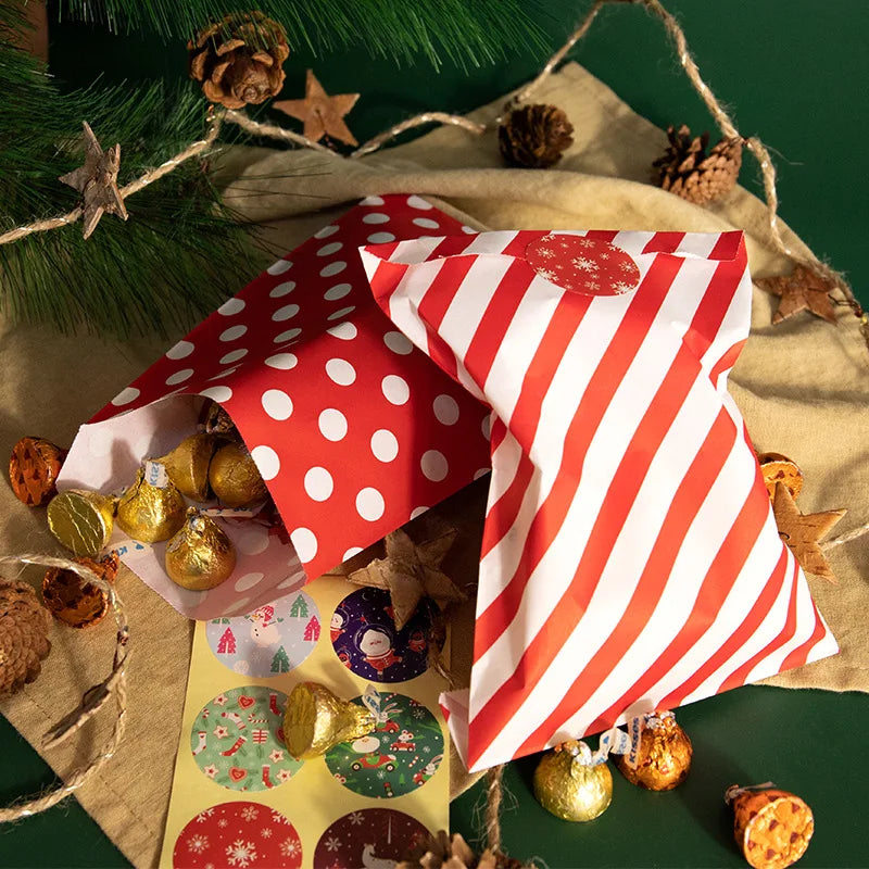 Christmas gift wrap bags with red polka dot and red-and-white striped paper accents