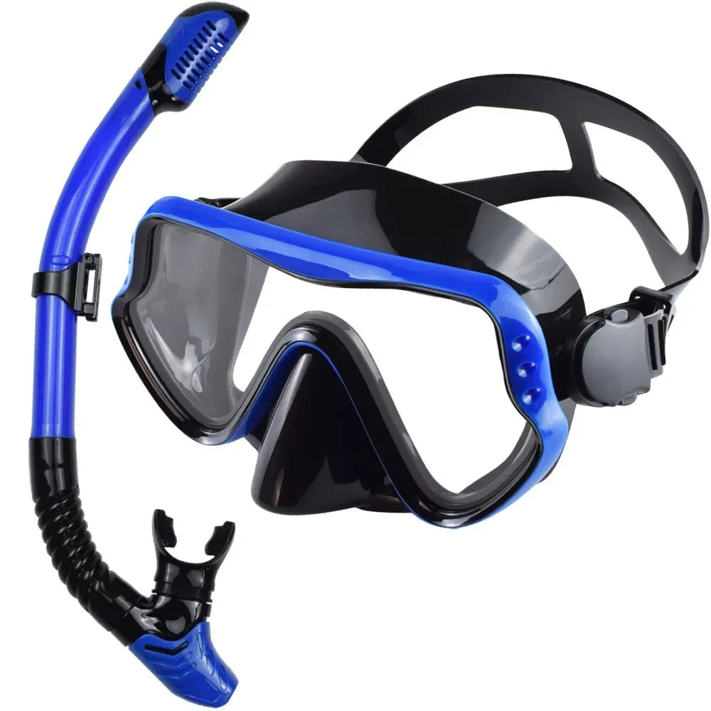 Adults dry snorkeling mask and snorkel set with blue frame accents and black mask skirt.