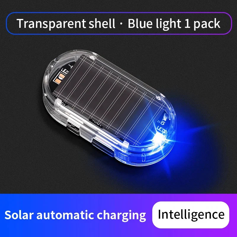 Transparent-shell solar dummy alarm light with blue LED glow, oval clear housing