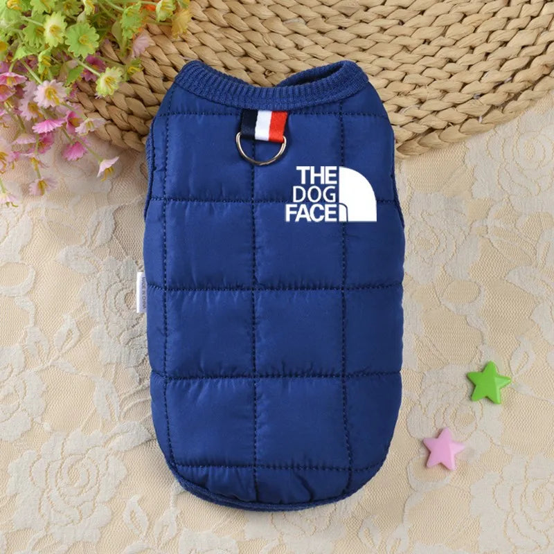 Pet dog puffer jacket, blue with front loop clasp and "THE DOG FACE" logo