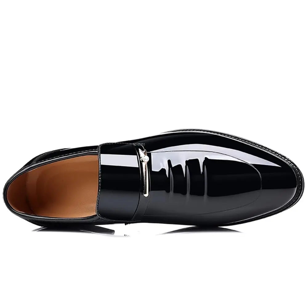 Men's black glossy slip-on loafer shoe with tan lining and open back