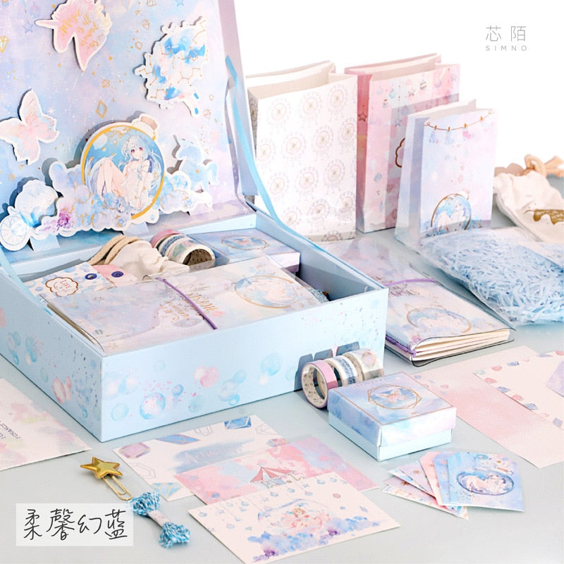 Blue stationery gift set box with patterned cards, stickers, and washi tape rolls