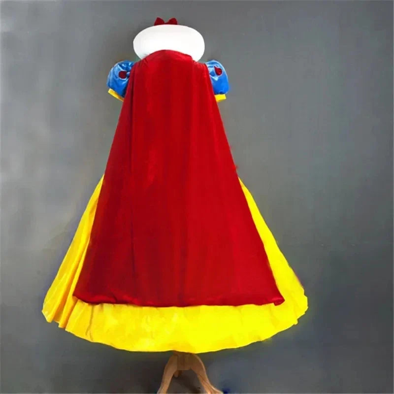 Back view of princess costume dress on mannequin: red cape, blue top, yellow hem