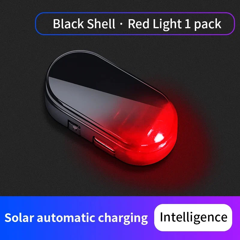 Black shell dummy security light with red LED glow through clear front lens