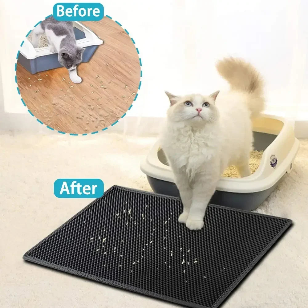 Black textured cat litter mat with hex grid surface under a standing cat