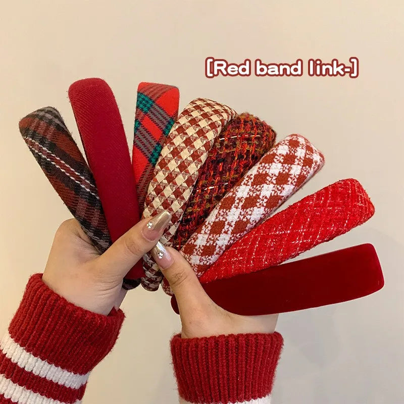 Set of fabric hair headbands with red and plaid patterns, wide cushioned bands.