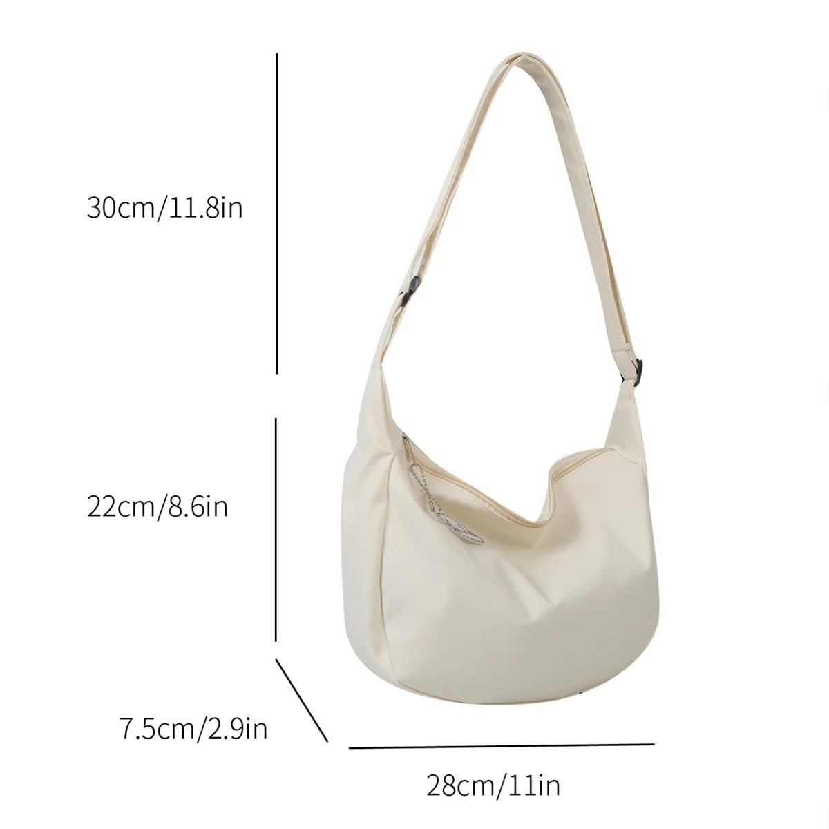 Cream crossbody bag size diagram with handle drop and width/height measurements