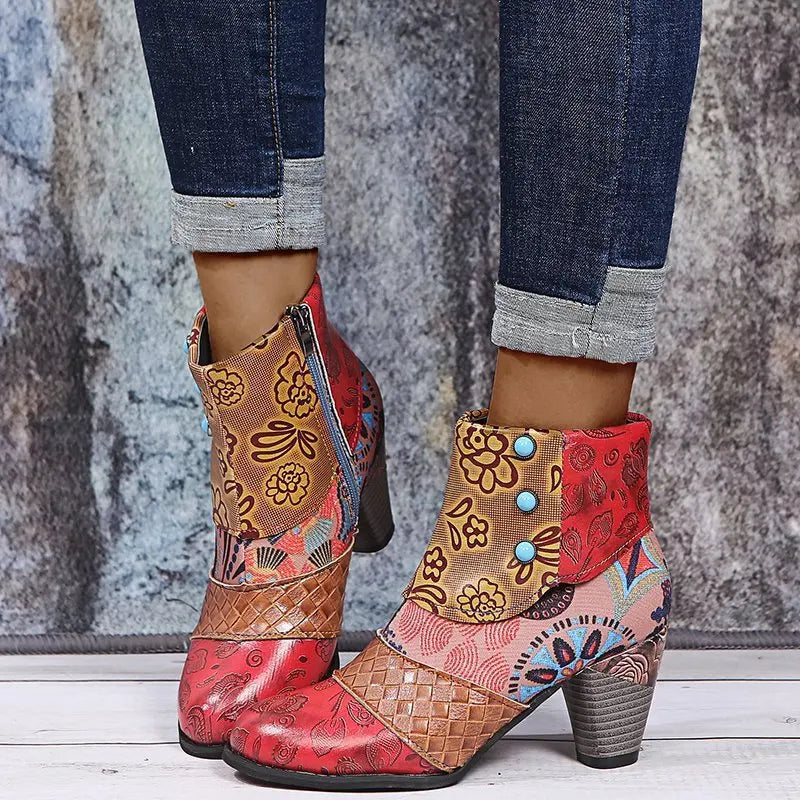 Women’s ankle boots with red and tan patchwork design, side zipper, and mid heel.