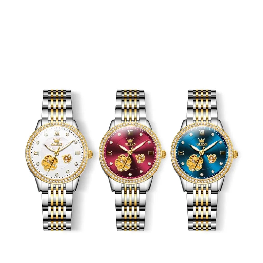 Set of three two-tone automatic bracelet watches with white, red, and blue floral dials